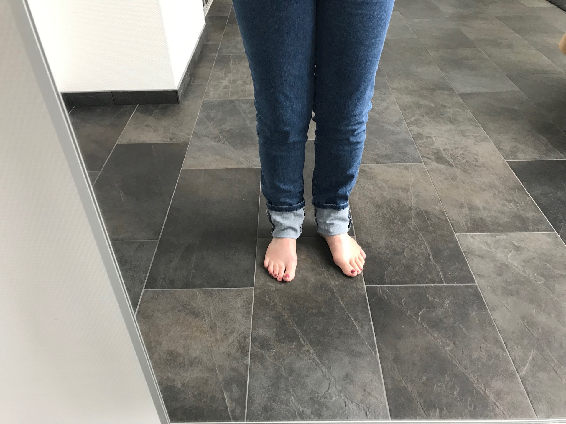 Hoe maak je je jeans korter met behoud van je originele zoom?