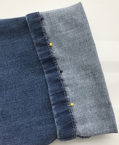 Hoe maak je je spijkerbroek korter met behoud van de originele zoom?