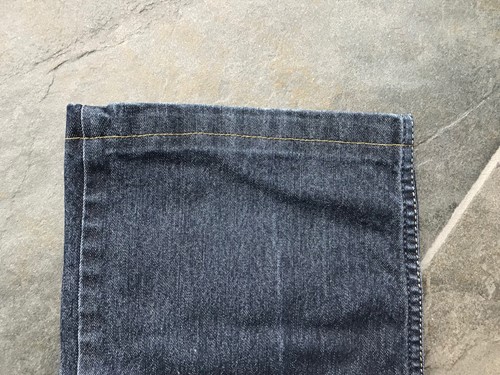 Hoe houd je de originele zoom van je spijkerbroek?