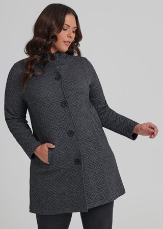 Hoe je een flatteuze winterjas voor vrouwen met een maatje meer. | Consulting